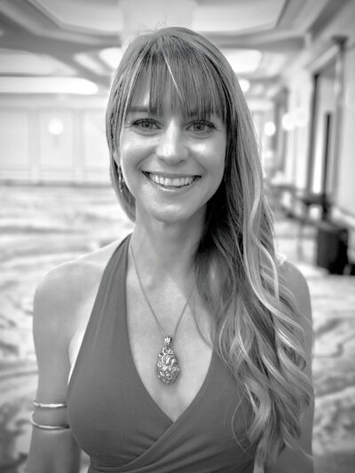 Black and white headshot of Christina Weber smiling