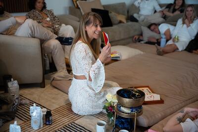 Christina Weber with group in a circle at Love Immersion VI